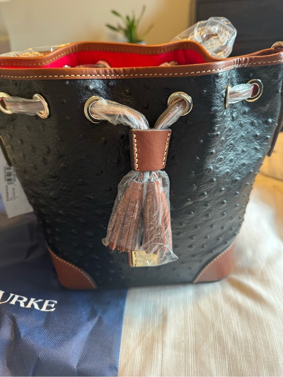 Dooney & Bourke Handbags - NWT Dooney and Burke, bucket bag, black and tan